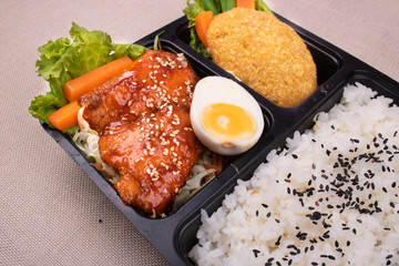 Rice with grilled salmon with teriyaki sauce