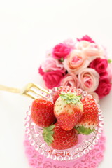 strawberry in glass bottle for spring dessert