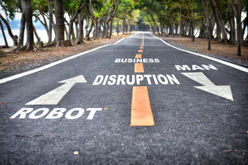 Robot vs man word with arrow on road. Business disruption challenge concept and survival idea