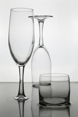 Glasses of champagne and a glass of whiskey