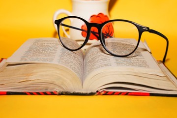 glasses on book