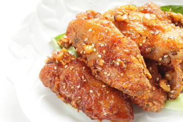 Korean food, deep fried chicken and sweet spicy sesame sauce