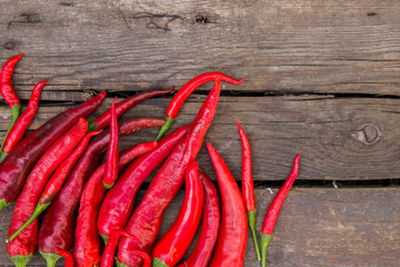 red hot pepper on wooden background
