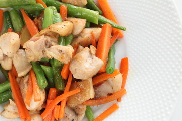 Chinese food, chicken and bean stir fried with carrot for comfort food