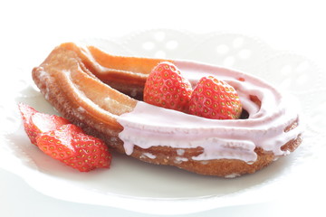 strawberry chocolate churros and fruit on dish for gourmet dessert