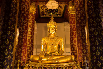 Ayutthaya, Thailand - June, 22, 2020 : Golden buddha image in ancient temple in Ayutthaya , Thailand