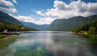 Fototapeta na wymiar the beautiful lake Bohinj in Slovenia with the mountains in the back