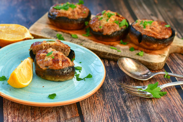  Delicious   Homemade Baked champignon caps stuffed with  beef minced meat , lemon and fresh parsley. 