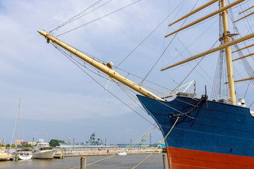 Fototapeta na wymiar Boat in the harbor of the mainmast of in the port in the seashore