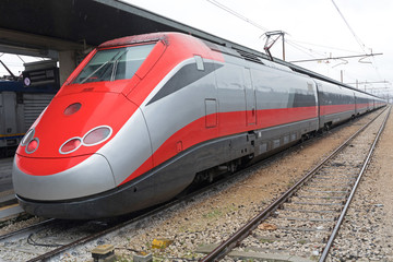 Fototapeta na wymiar Fast Train Locomotive in Venice Italy
