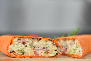 kebab meat with vegetables on a wheat tortilla