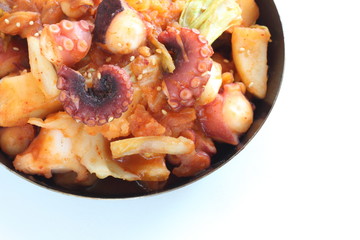 Korean food, octopus and potato stir fried with cabbage