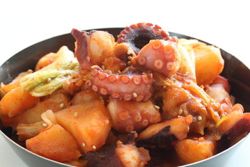 Korean food, octopus and potato stir fried with cabbage