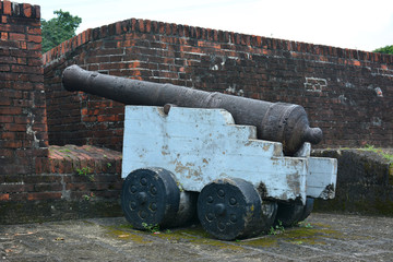 Old cannon ball defense for war artillery display during Spanish era