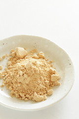 Japanese food ingredient, soy powder on dish with copy space
