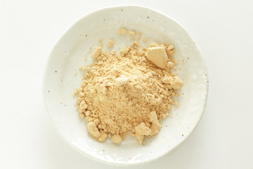 Japanese food ingredient, soy powder on dish with copy space