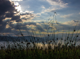 morning summer mountain landscape with fog and clouds in the sky