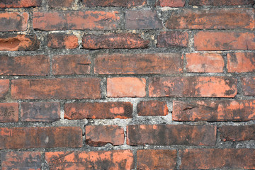 Red solid bricks background during Spanish era