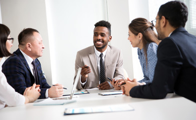 Multy-ethnic group of business people working at office