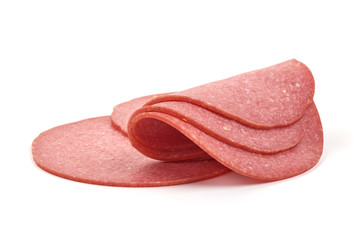 Thin salami sausage slices, isolated on white background