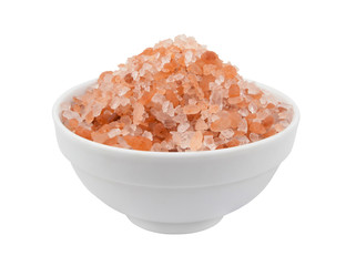 Himalayan pink rock salt in bowl isolated on white background
