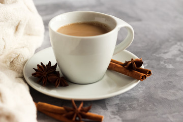 Obraz na płótnie Canvas cup of coffee drink with cinnamon sticks and star anise