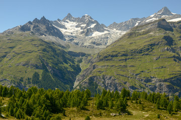 Fototapeta na wymiar Mountain landscape with glacier over Zermatt in the Swiss alps