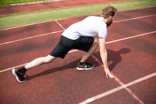 A starting position of a sprinter on a running track.
