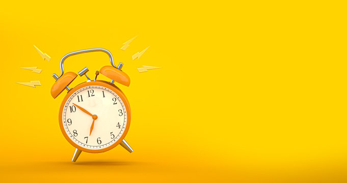 Termindruck &ndash; Klingelnder Wecker auf gelben Hintergrund