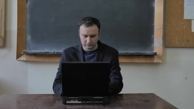 Young Man Sitting Table Working Old Laptop 