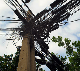 Confusing and Messed-up Electricity cables of Electricity pole , Bangkok Thailand