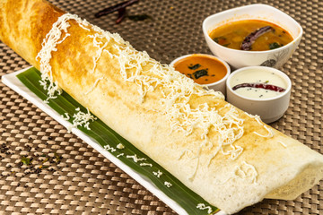 Cheese plain dosa famous south Indian breakfast crepes with cheese potato filling, selective focus