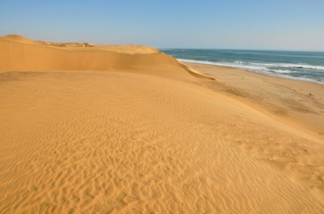 Fototapeta na wymiar The Namib Desert meeting up with the Atlantic Ocean on the West Coast of Namibia