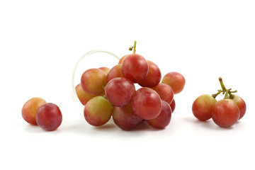 Naklejka na ściany i meble Fresh red grape isolated on white background