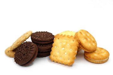 Various butter cracker pile isolated on white background