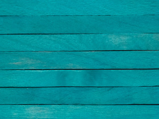 Obraz premium Background of blue popsicle sticks with horizontal view.