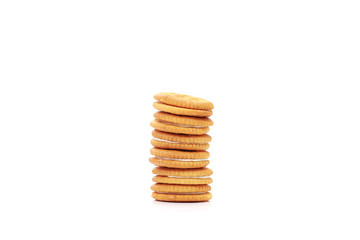 Stack of salted buttercream crackers on white background