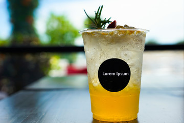 Passion fruit juice and  soda mixed with ice, cool drinks beautiful decorated put on the table at the beach bar