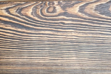The texture of the wood treated by the method of brushing. Pine.