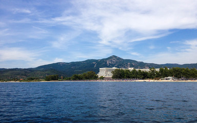 Greece sea and in the background the small town of Halkidiki, Northern Greece