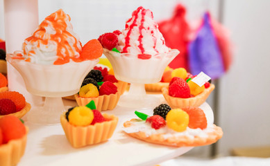 Collection of soap in the form of ice cream, cake and other sweets.