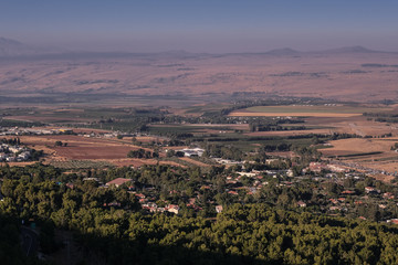 View of Hula Valley with Hula Lake and Sea of Galilee (Lake Kinneret) at sunset as seen from Mitzpe Hayamim hotel, located in Upper Galilee of northern Israel, Israel.
