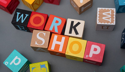 word webinar coaching workshop concept cubes