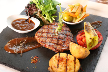 New York Steak, Marinated With Fresh Spices Beef Tenderloin Meat, Special Sauce and Garnish