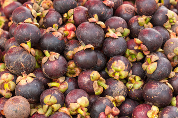 Mangosteen fresh fruit, mangosteens in the market.
