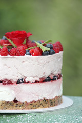 Home made cheese cake with organic fruit. Cake decoration. Food photography.