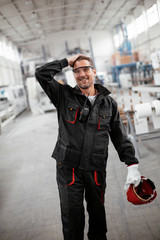 Portrait of worker in factory.