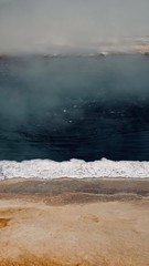 Abstract Dark Blue Natural Spring with White Rocky Edge
