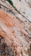 Abstract Red, Orange, and White Rocky Mountain Side
