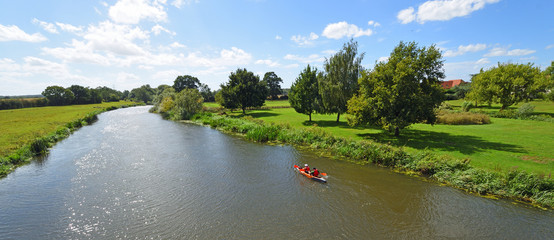 The River Ouse at  Great Barford Bedfordshire England with canoe 